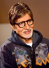A smiling, bearded Amitabh Bachchan