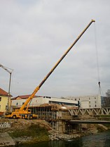 Liebherr truck mounted crane building a bridge