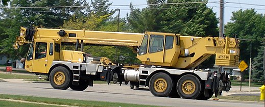 A Grove truck-mounted crane in road travel configuration