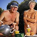 Image 6A publicity photo showing a mature naturist couple making tea. North America (from Naturism)
