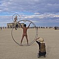 Image 10Naked participant at Burning Man 2016 posing as Leonardo da Vinci's Vitruvian Man (from Naturism)