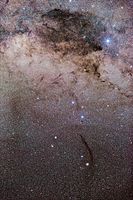 The Coalsack Nebula can be seen as the large dark region near the top of the photo (the thin long nebula at the bottom is the Dark Doodad Nebula).