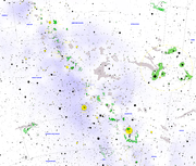 A starchart of the Galactic Center area, with the Rho Ophiuchi cloud complex marked as large green area in the middle of the right half of the chart.