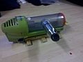 Reconfiguring vacuum cleaner so lays flat on table